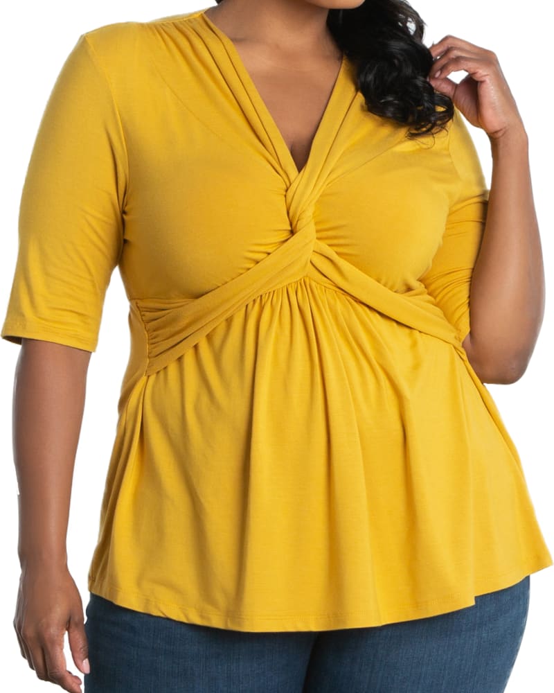 Front of a model wearing a size 0X Hannah Twist Top in MARIGOLD by Kiyonna. | dia_product_style_image_id:220337